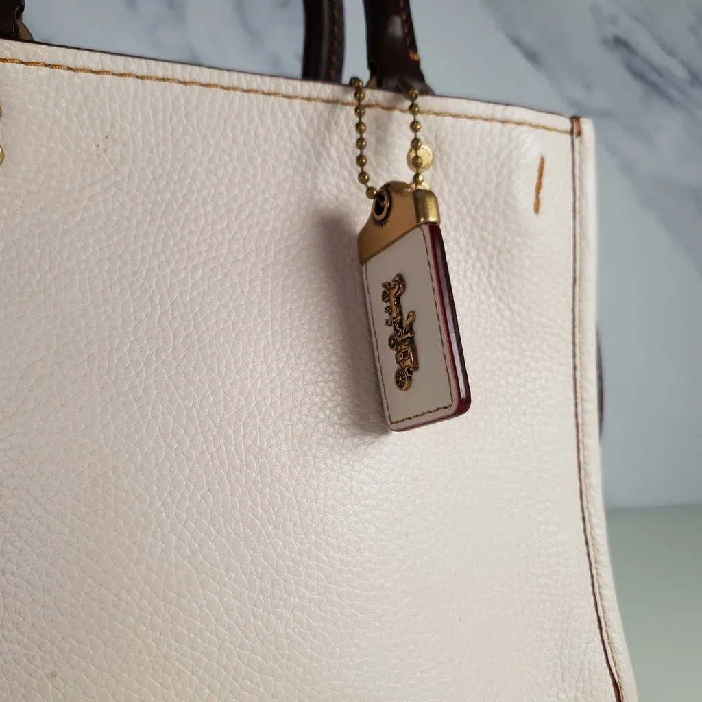 Coach 1941 Rogue 25 in Chalk - Shoulder Bag Handbag in White Pebble Leather Colorblock Oxblood Handles
