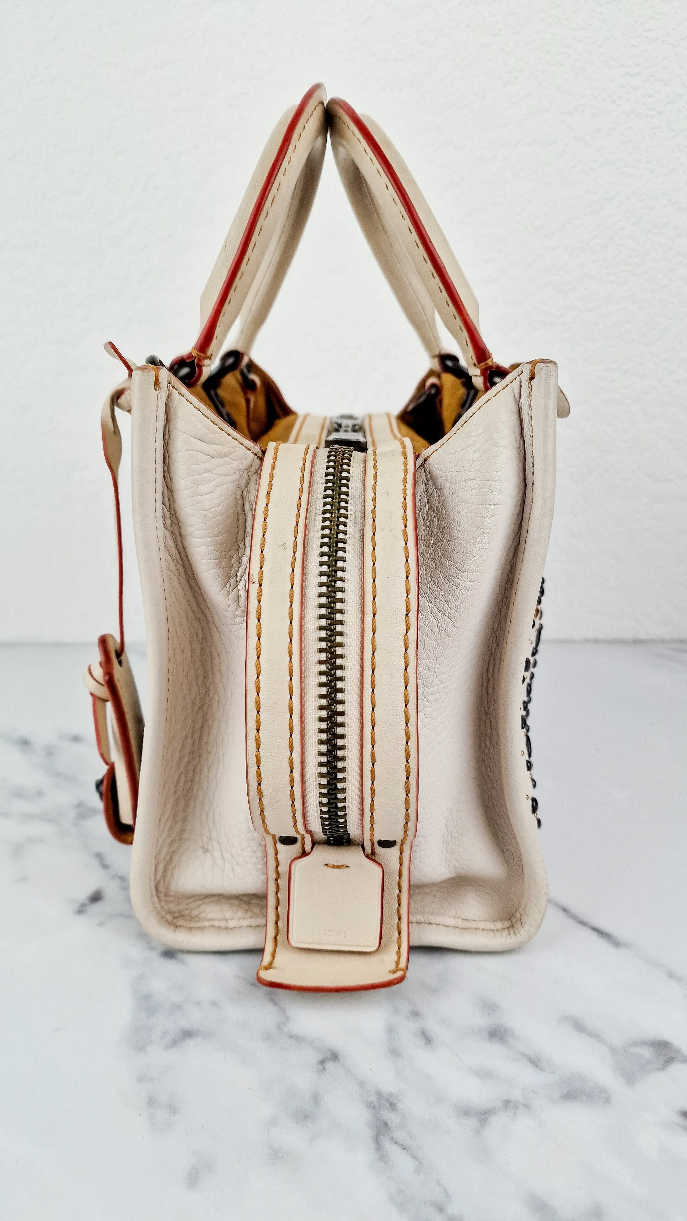 Coach 1941 Rogue 25 in Chalk White With Pyramid Prairie Rivets Pebble Leather Satchel - Coach 54551