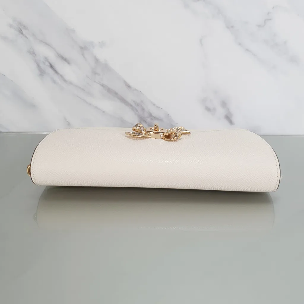 Coach Chain Crossbody Wristlet Clutch with Bow Turnlock in Chalk and Gold