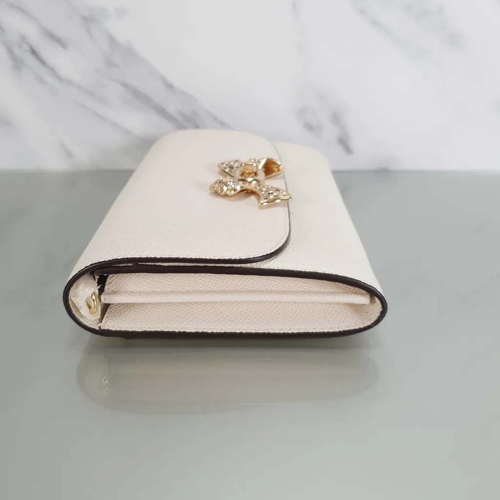 Coach Chain Crossbody Wristlet Clutch with Bow Turnlock in Chalk and Gold