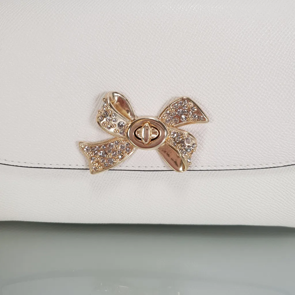 Coach Chain Crossbody Wristlet Clutch with Bow Turnlock in Chalk and Gold