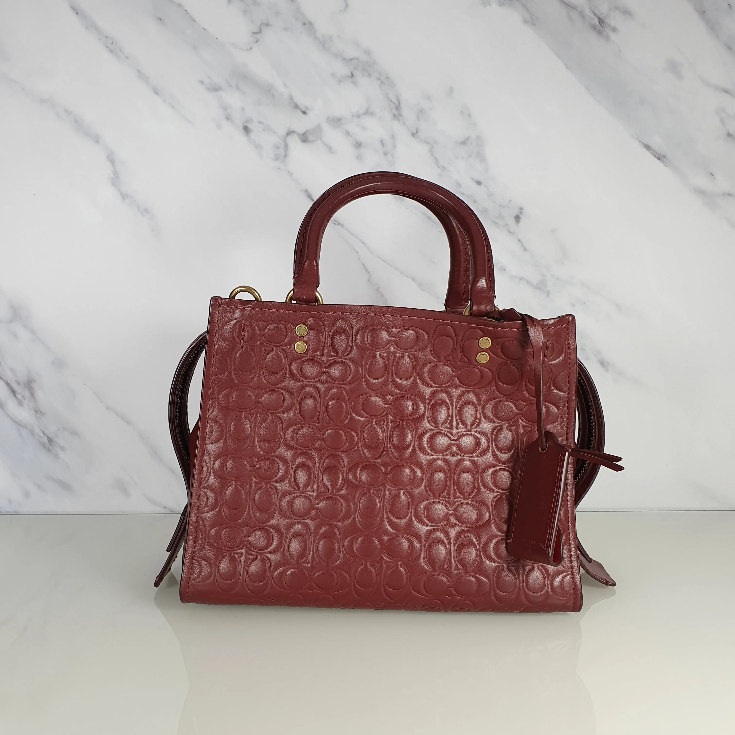 Coach Rogue 25 in Burgundy Signature Embossed Leather with Floral Bow Lining