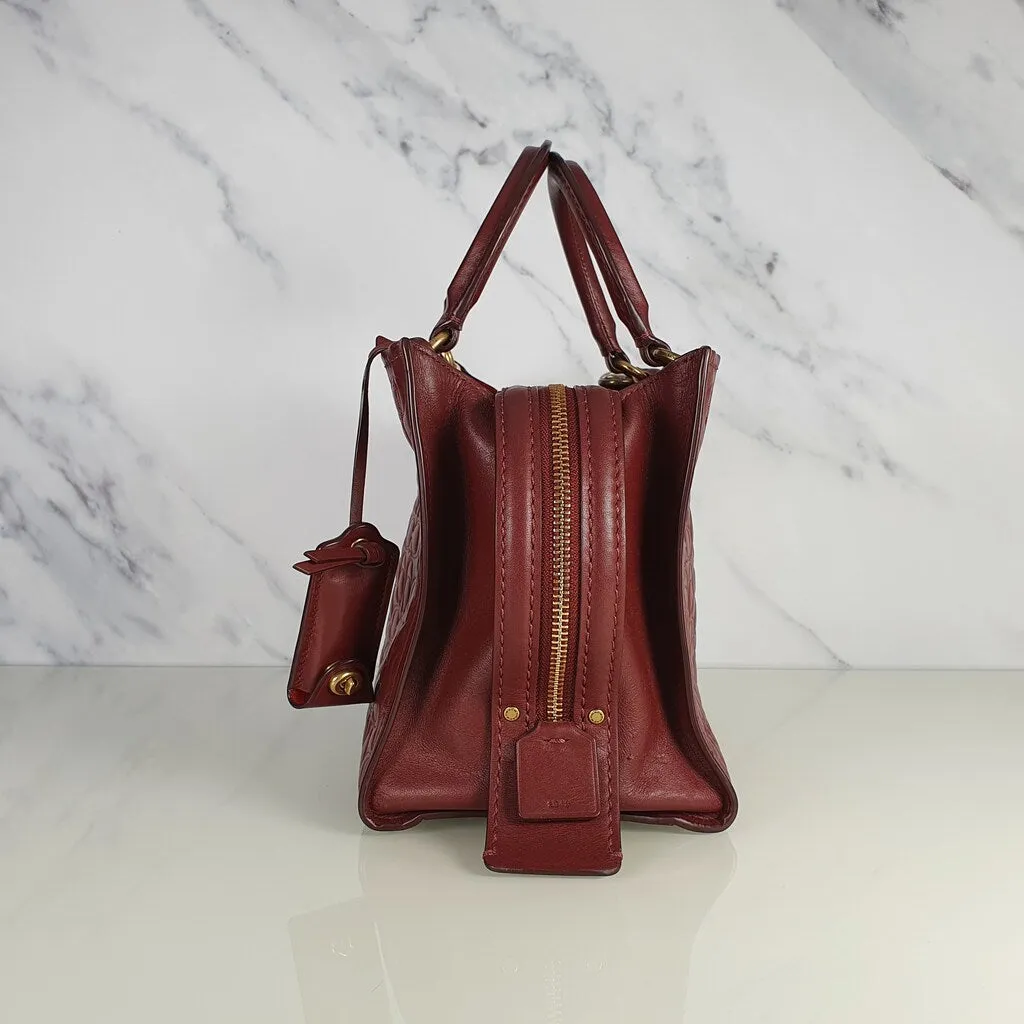 Coach Rogue 25 in Burgundy Signature Embossed Leather with Floral Bow Lining