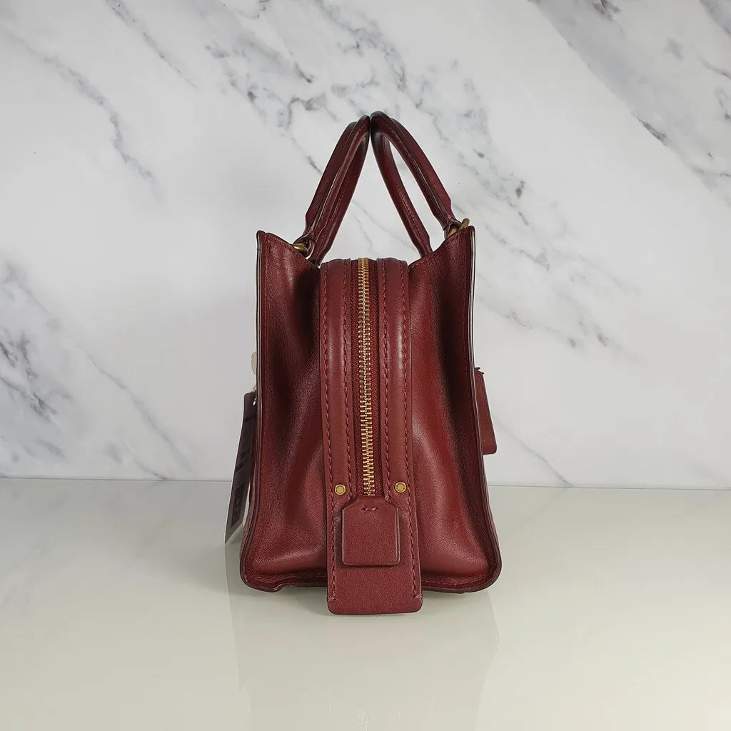 Coach Rogue 25 in Burgundy Signature Embossed Leather with Floral Bow Lining