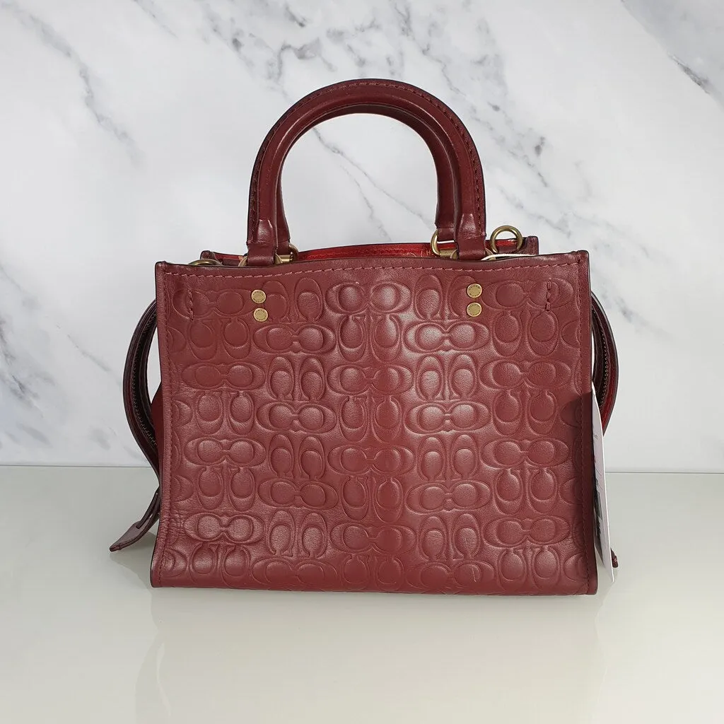 Coach Rogue 25 in Burgundy Signature Embossed Leather with Floral Bow Lining