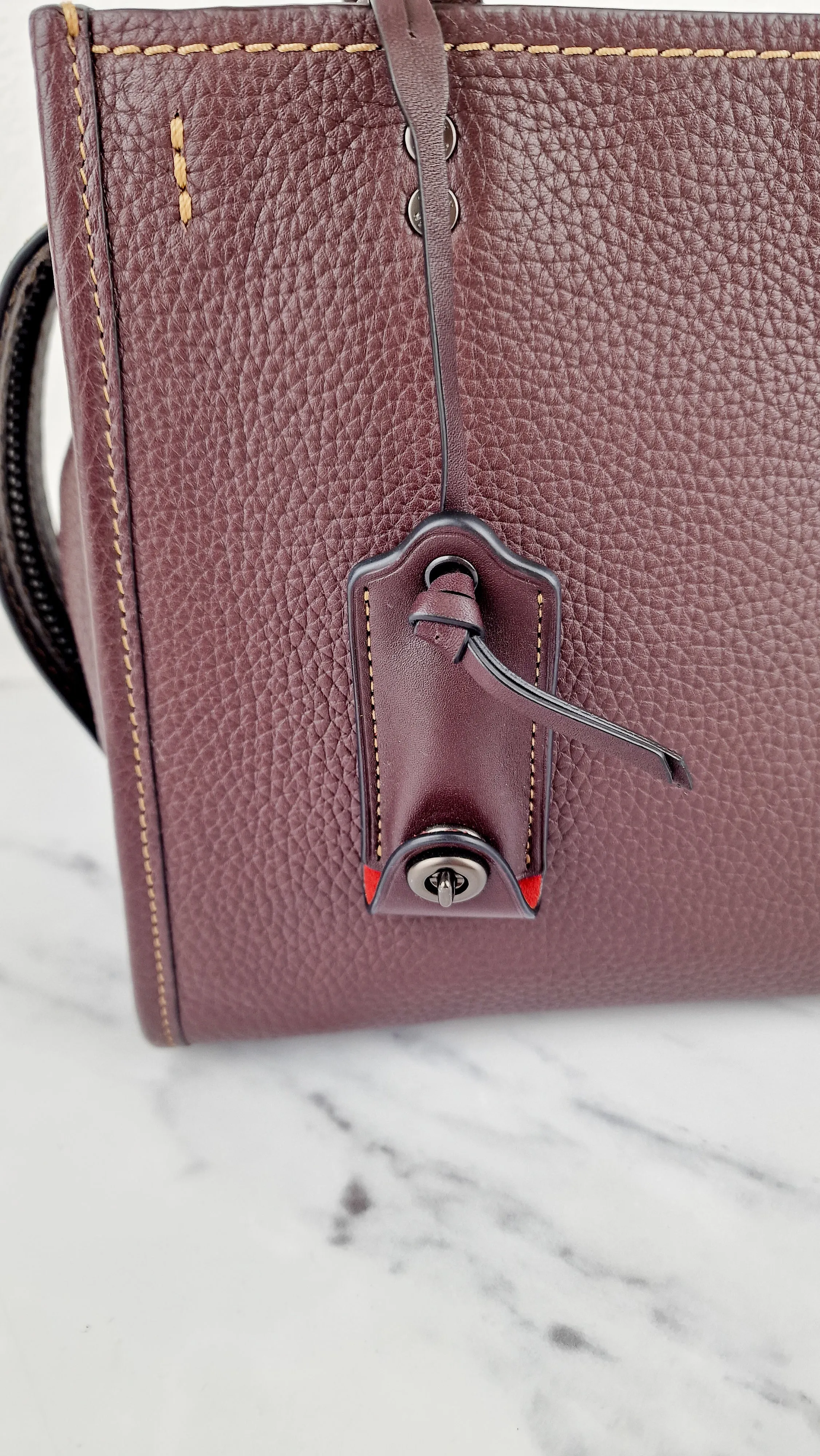 Coach Rogue 25 in Oxblood Pebble Leather with Red Suede Lining Coach 54536